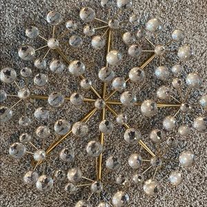 Gold and mirrored wall art